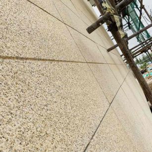 怀化 黄金麻花岗岩荔枝面外墙干挂石材效果示例