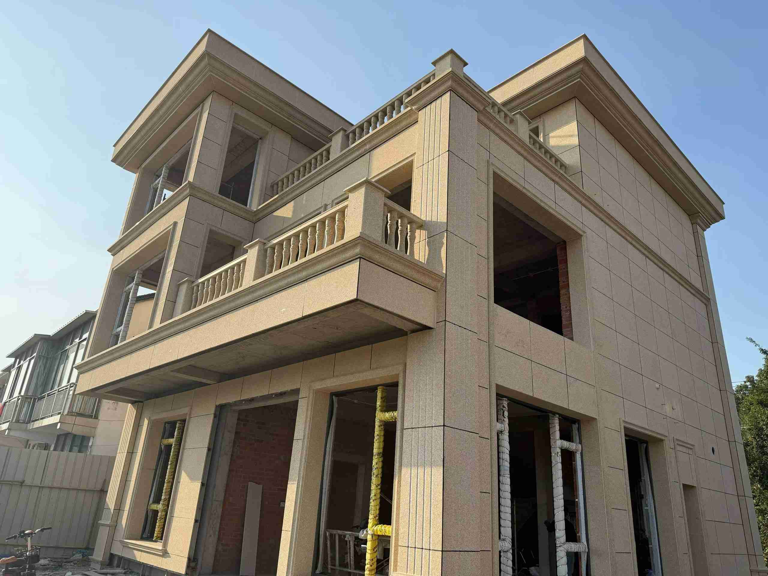 怀化 黄金麻花岗岩石材荔枝面外墙干挂效果展示